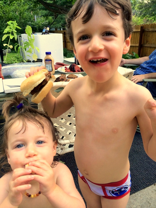 Two of our kids enjoying our Father's Day BBQ.