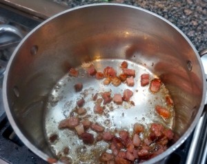 Crisp the bacon over low-medium heat so that it doesn't burn or spatter fat. This will add a smokey flavor to your minestrone soup.