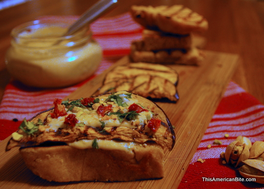 Balsamic marinated eggplant on crostini with cilantro lime hummus